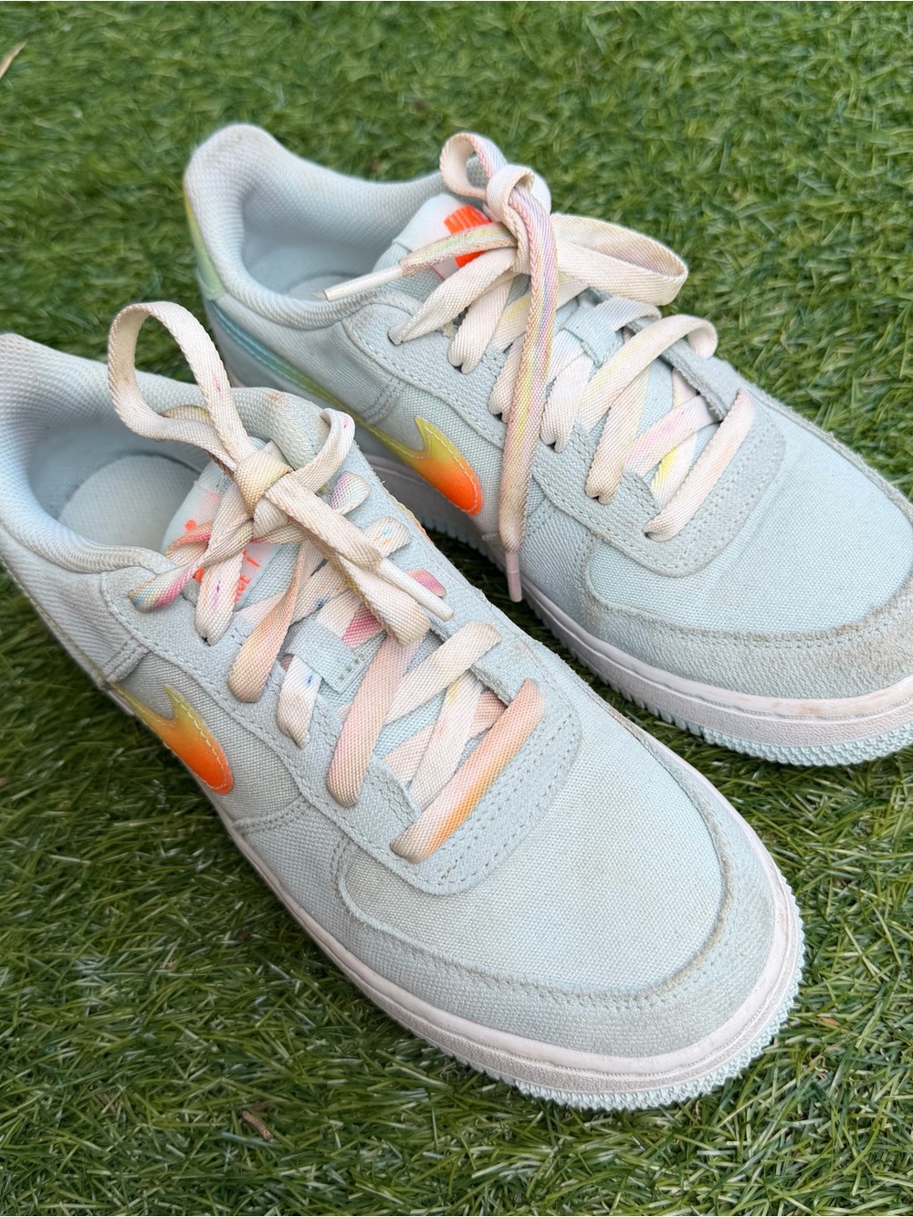 Nike Light Blue Canvas Sneakers with Gradient Orange Swoosh